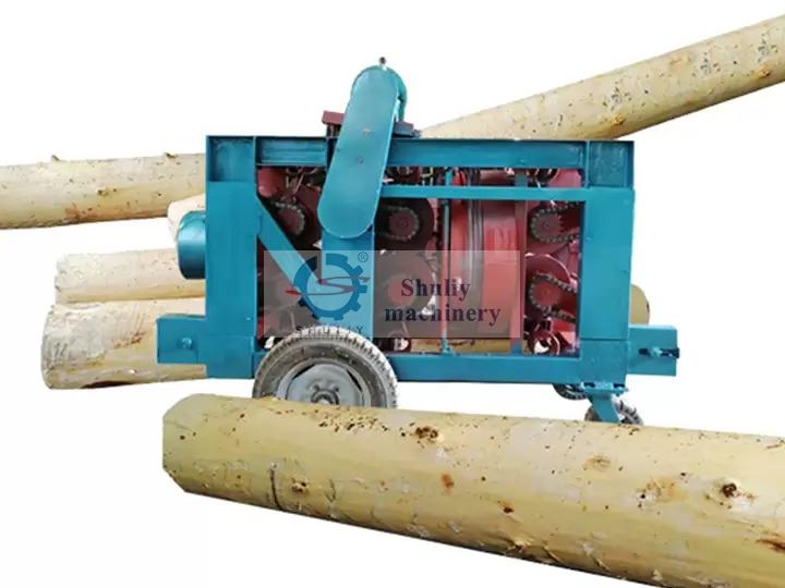 Rotary wood debarker machine