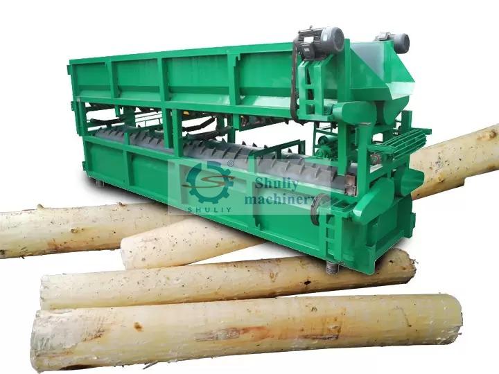 Trough log debarker machine